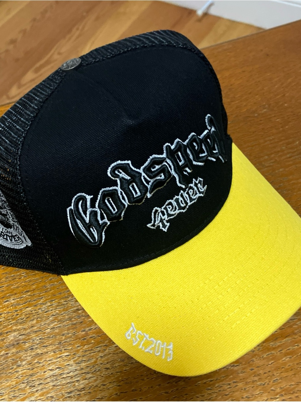 Black and Yellow Mesh Trucker Hat with Embroidered Script